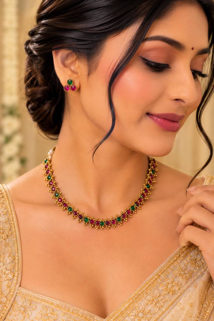 Gold-tone ruby and emerald round stone necklace set with earrings