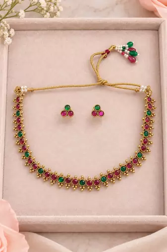 Gold-tone ruby and emerald round stone necklace set with earrings