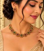 Antique gold-tone floral bead necklace set with red and green accents