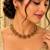 Antique gold-tone floral bead necklace set with red and green accents