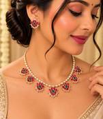 Gold-tone pearl necklace set with pink and green floral motifs