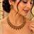Antique gold-tone floral leaf necklace set with dangling charms