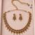 Antique gold-tone floral leaf necklace set with dangling charms