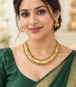 Traditional gold-tone coin necklace set with embossed medallions