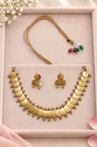 Traditional gold-tone coin necklace set with embossed medallions