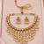 Gold-tone pearl fringe necklace set with traditional earrings