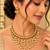 Gold-tone pearl fringe necklace set with traditional earrings