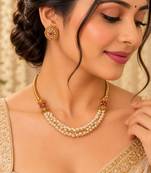 Gold-tone multi-strand pearl necklace set with traditional stud earrings