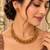 Traditional gold-tone beaded necklace set with matching stud earrings