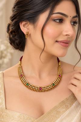 Pure brass geometric necklace set with green and pink stone accents 1