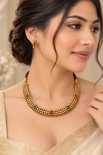 Pure brass geometric necklace set with green and pink stone accents