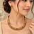 Pure brass geometric necklace set with green and pink stone accents