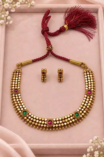 Pure brass geometric necklace set with green and pink stone accents