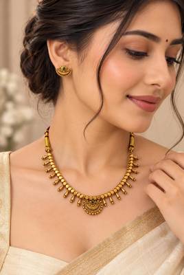 Pure brass geometric necklace set with green center stone 1