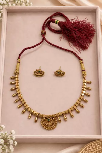 Pure brass geometric necklace set with green center stone