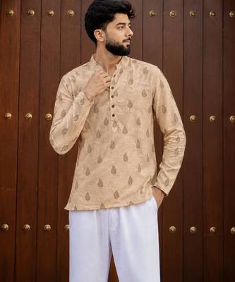 Peach color smart and ethnic swiss linen fabric fetive printed short kurta for men's trendy looks 1
