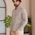 Off white color smart and ethnic swiss linen fabric fetive printed short kurta for men's trendy looks