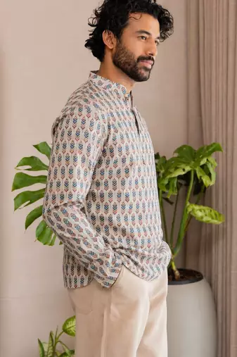 Off white color smart and ethnic swiss linen fabric fetive printed short kurta for men's trendy looks