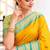 Golden yellow zari woven silk blend traditional saree with blouse