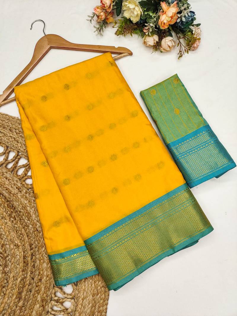 Golden yellow zari woven silk blend traditional saree with blouse