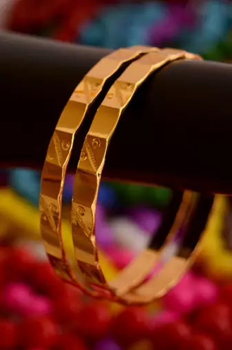 Golden Embossed Bangles Set