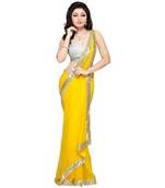 yellow embroidered georgette saree with blouse