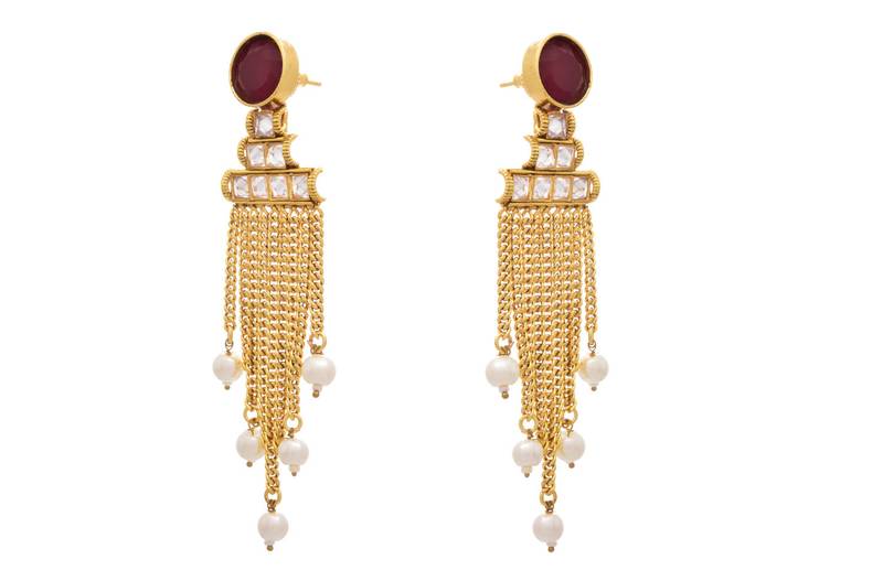 Radiant & Ravishing Red Gold Designer Earring embellished with Pearls.