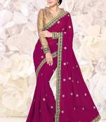 Magenta embroidered georgette saree with blouse