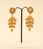 Golden Three Layered Jhumkas with A Kundan Stud