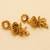 Golden Three Layered Jhumkas with A Kundan Stud