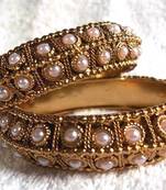 Golden pearl bangles