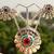 9.25% silver pendant set along with ear tops crafted with natural precious stones