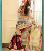 red and cream embroidered net saree with blouse