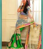 green and cream embroidered net saree with blouse
