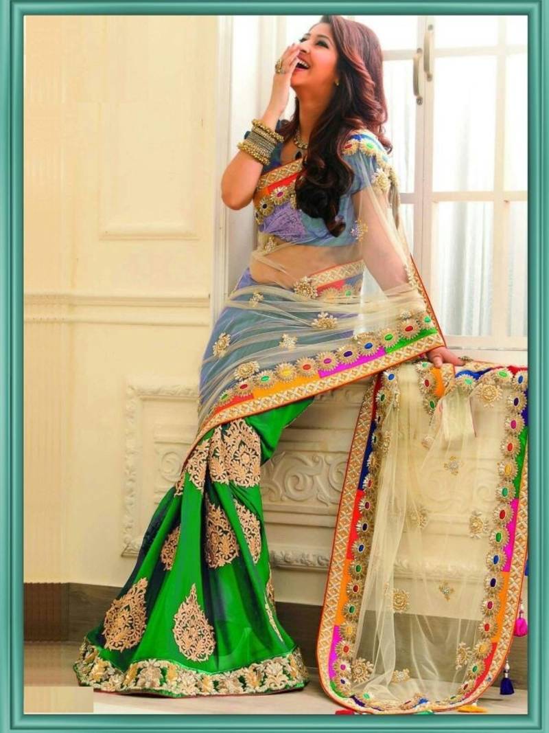 green and cream embroidered net saree with blouse