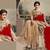 red and cream embroidered velvet and net saree with blouse