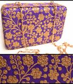 Purple clutches embroidered