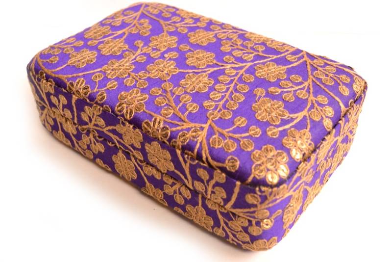 Purple clutches embroidered