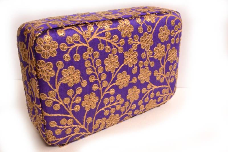 Purple clutches embroidered