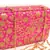 Pink clutches embroidered