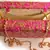 Pink clutches embroidered