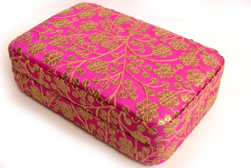 Pink clutches embroidered