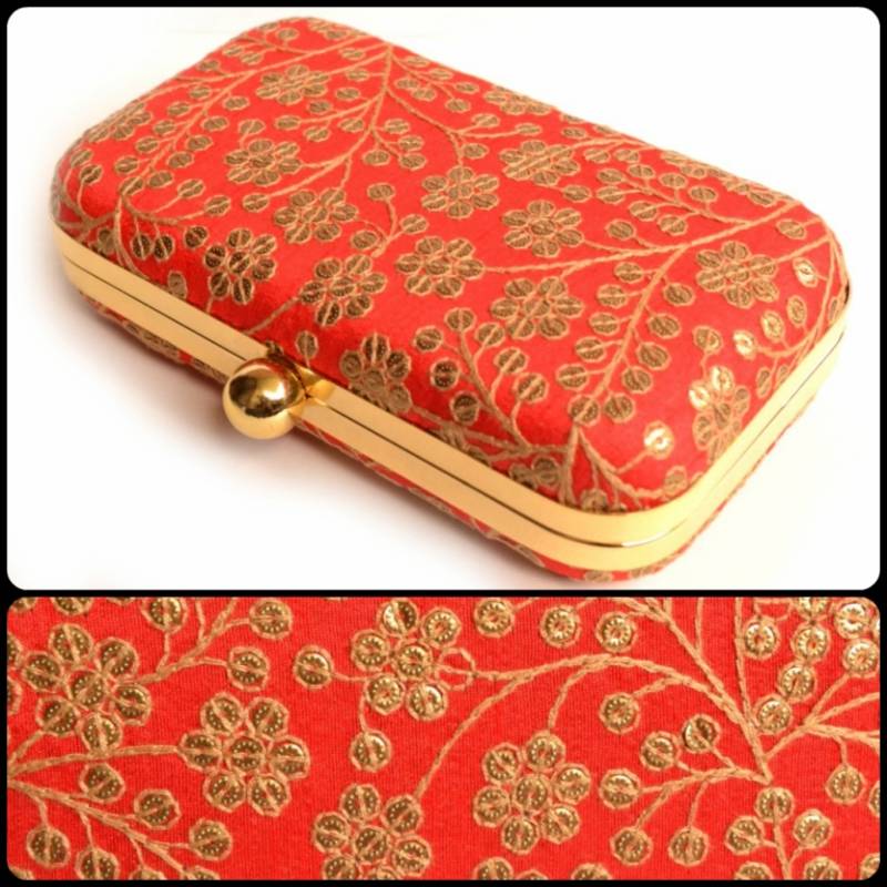 Red clutches embroidered