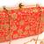 Red clutches embroidered