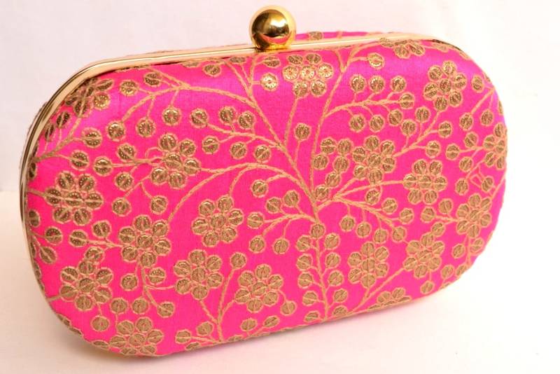Pink clutches embroidered