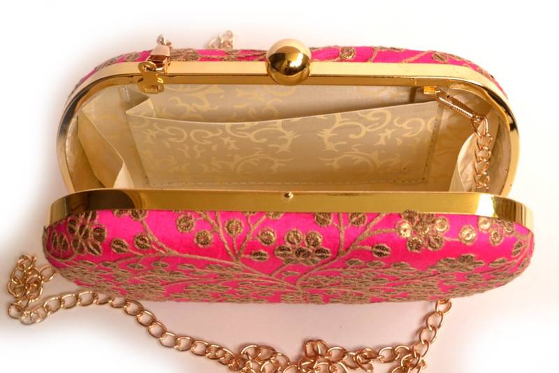 Pink clutches embroidered