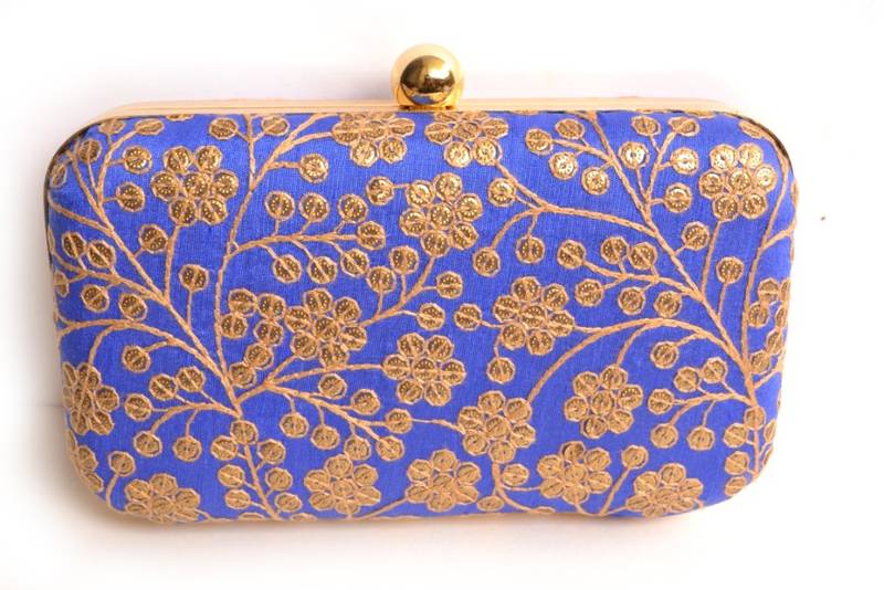 Blue clutches embroidered