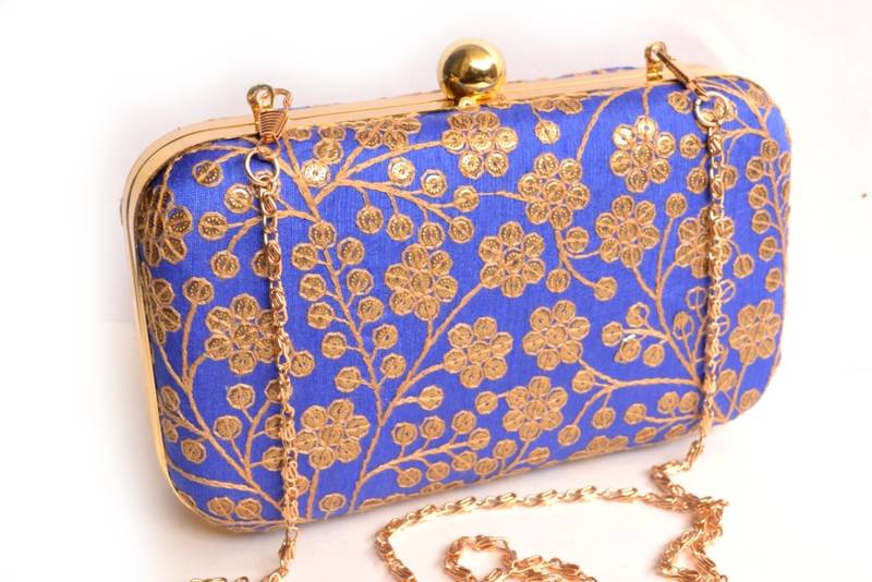 Blue clutches embroidered