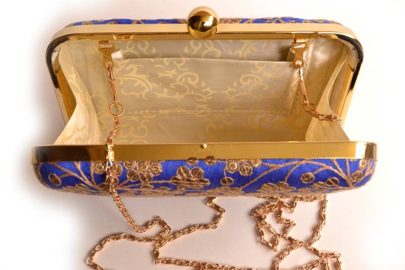 Blue clutches embroidered