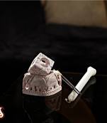 Carved elephant candle stand